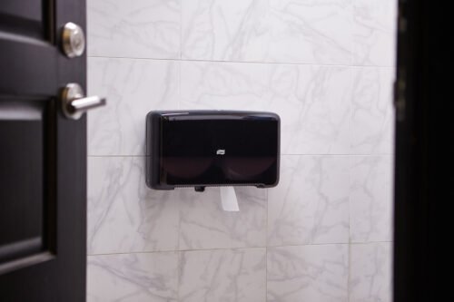 555508-e-com-2-lifestyle-1-universal TorkĀ® T2 Advanced Mini Jumbo Toilet Paper - White 2-Ply 12x750